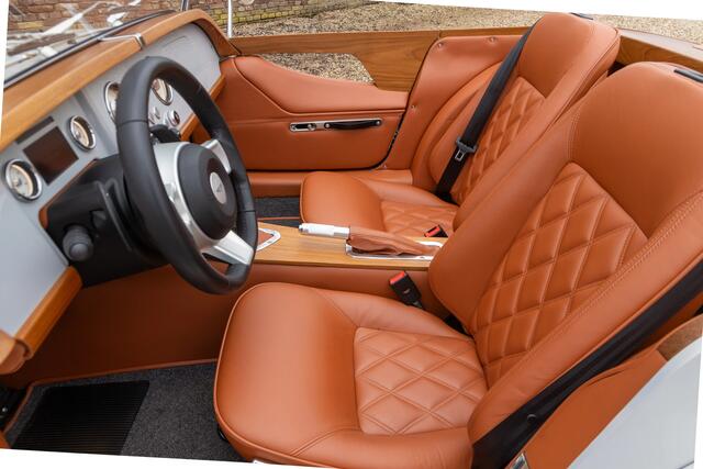 Morgan Midsummer "Limited collector's item" One of the fifty built by Morgan with Pininfarina's design input,Ordered with the high windscreen, Pininfarina's idea of a 'barchetta' style with influences from the 1930s and 1940s, Livery in "Grigio Cangiante" over Tan soft grain leather, The use of mat